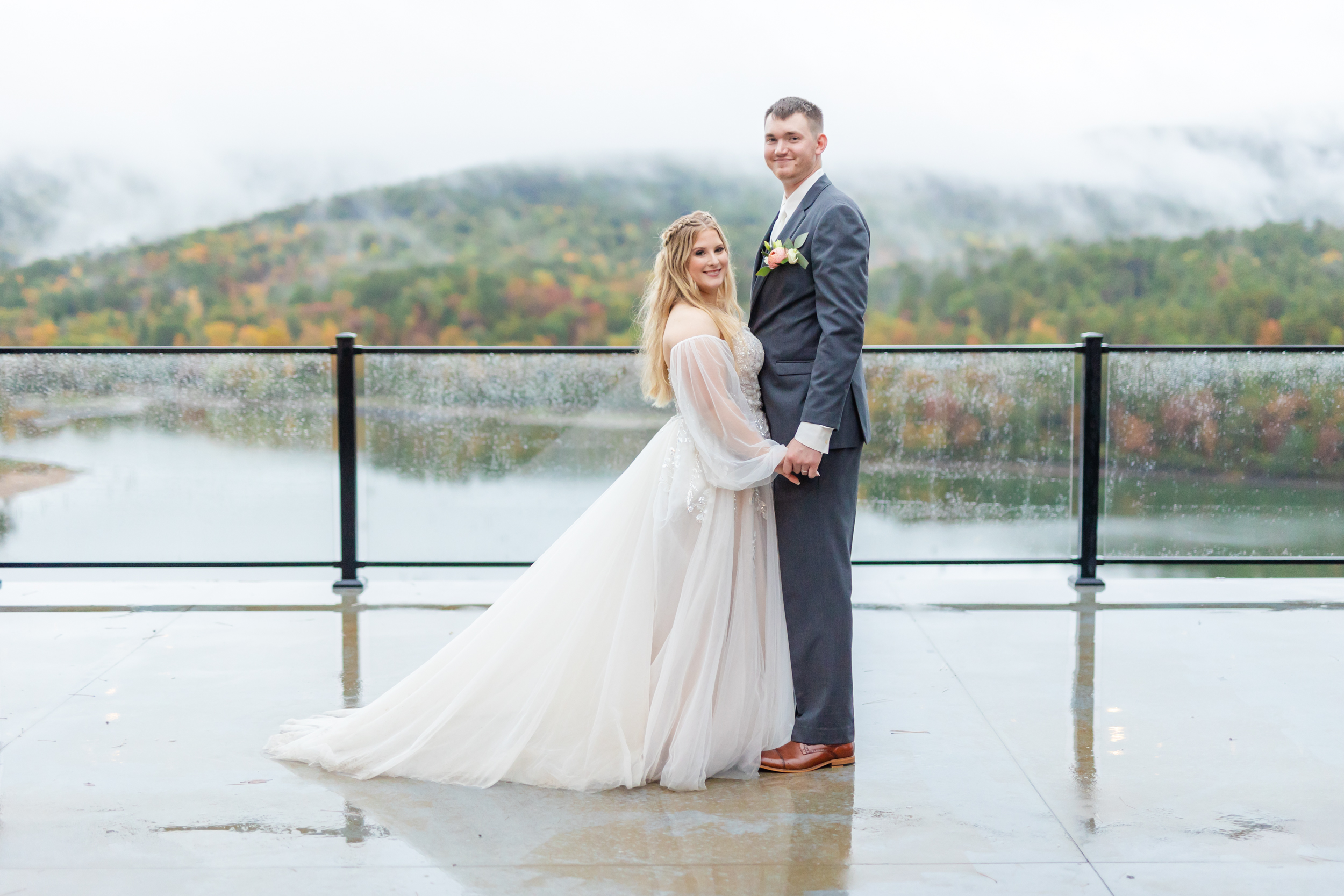 traditional bridal portrait with the couple smiling at the camera