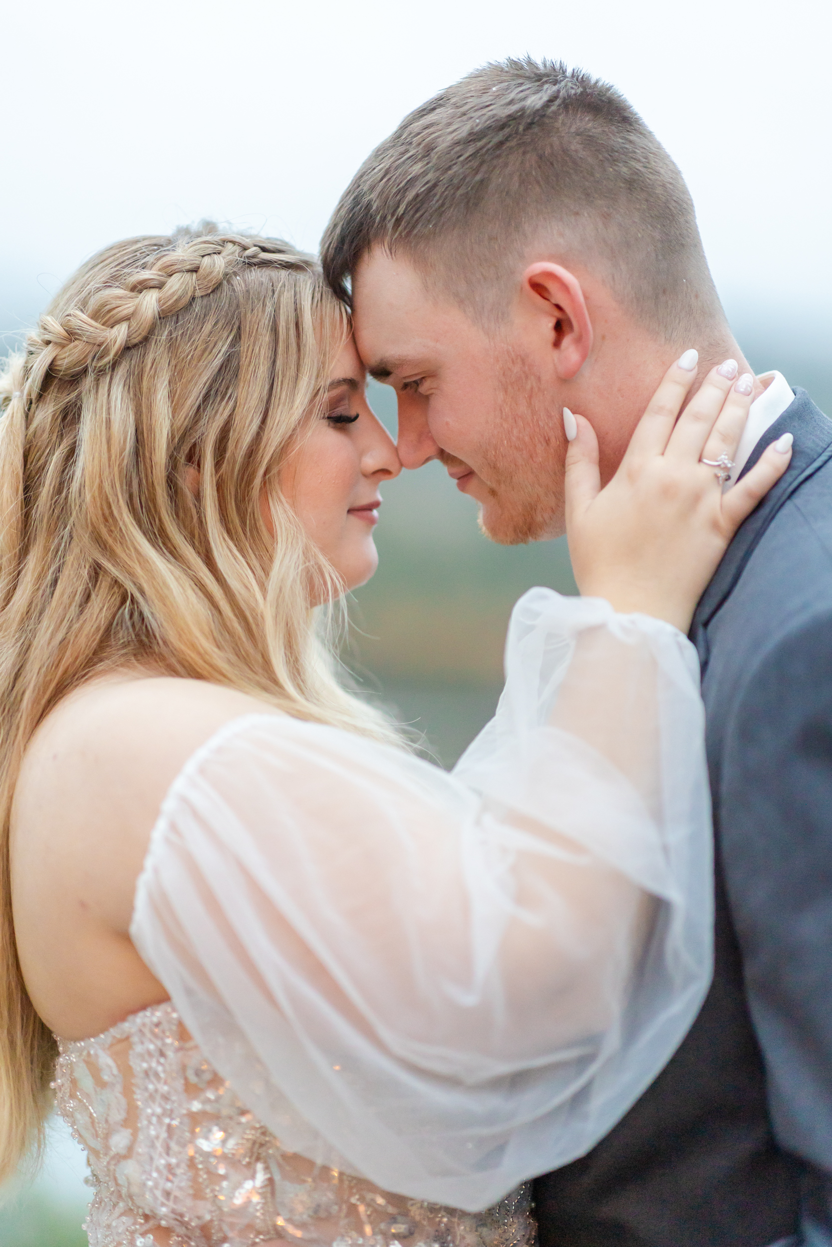 quiet moment between the bride and groom